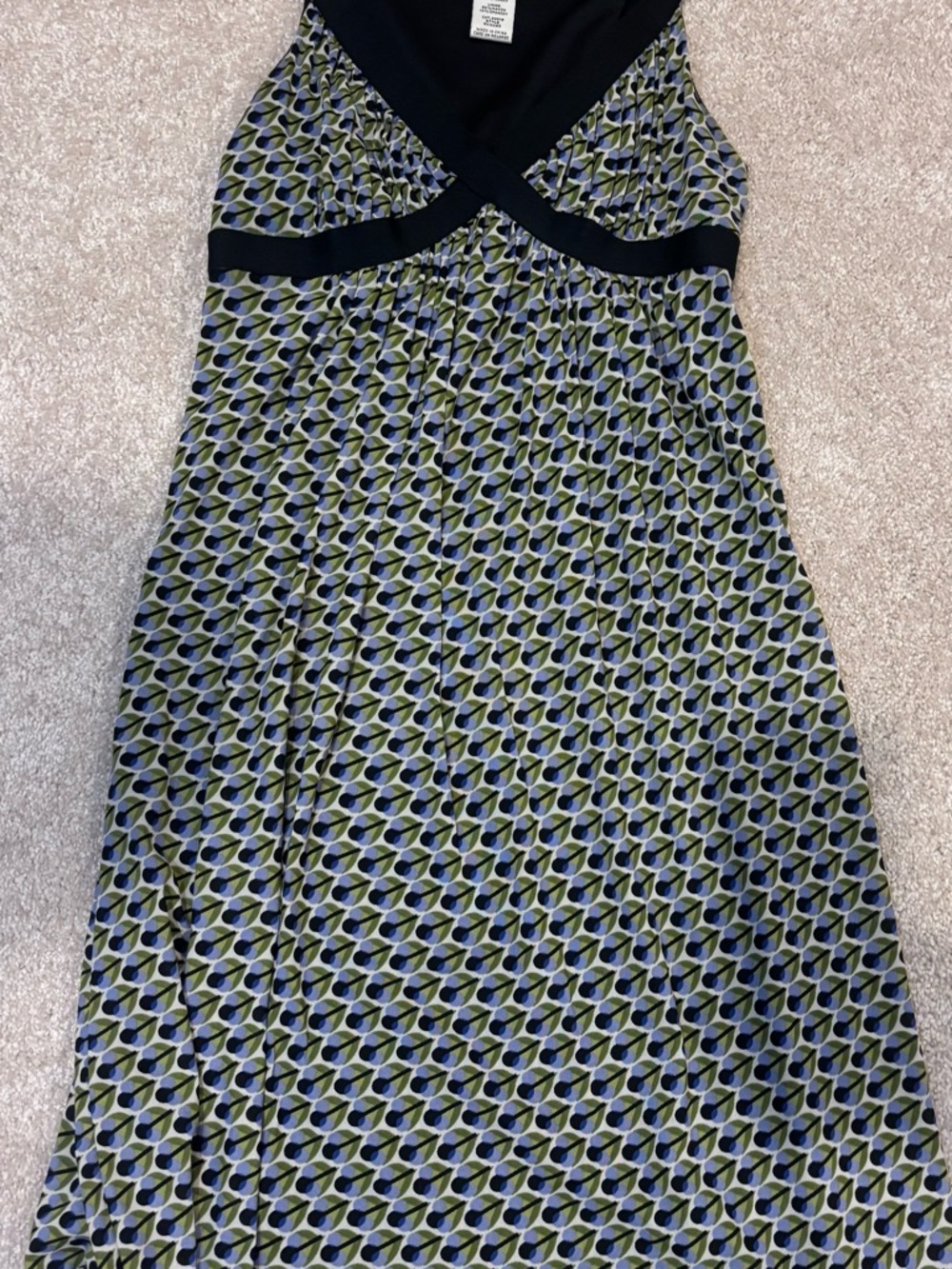 Sleeveless Geometric Print Fit-and-Flare Dress in Navy and Olive “Peacock”